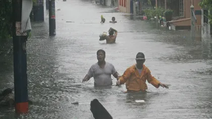 Inundaţii puternice în Vietnam: cel puţin şase morţi şi 20.000 de persoane evacuate