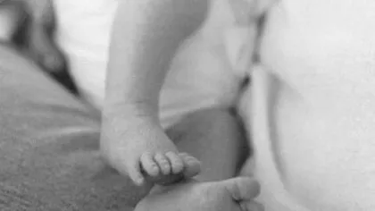 Femeia care şi-a ascuns copilul mort în sifonier, reţinută