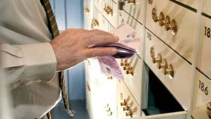 Fitch: Sectorul bancar din România, perspectivă negativă în 2014