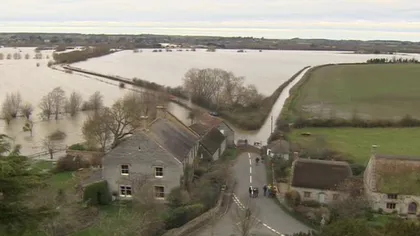 Un mic sat britanic s-a transformat în insulă, din cauza inundaţiilor FOTO