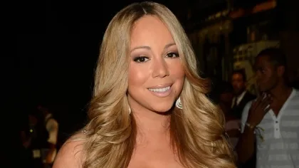 Mariah Carey a uitat deja de Nick Cannon. În braţele cui a fost fotografiată
