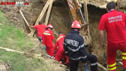 Un muncitor şi-a DECAPITAT un COLEG cu un EXCAVATOR după ce acesta a fost prins sub un maldăr de pământ