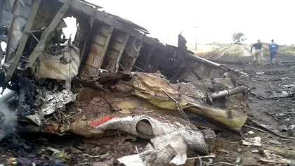 Observatorii OSCE au primit acces limitat la locul prăbuşirii avionului în Ucraina