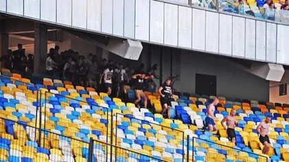 Război şi pe stadion în Ucraina. Scene ŞOCANTE, fanii lui Dnepr atacă suporterii danezi VIDEO