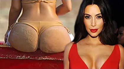 Kim Kardashian plăteşte doi bărbaţi să îi cureţe fundul de nisip şi să i-l maseze FOTO