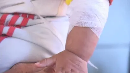 O fetiţă de un an, bătută cu bestialitate de concubinul mamei VIDEO