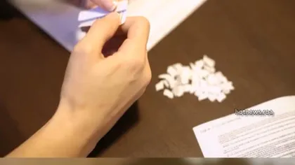 Angajata pusă să rupă hârtii A CÂŞTIGAT procesul cu firma VIDEO