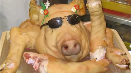 Românii mănâncă 1 MILION de porci de Crăciun