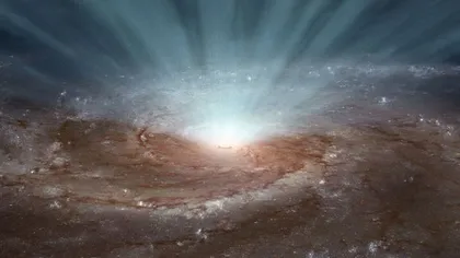 O gaură neagră uriaşă a generat un vânt cosmic care poate înghiţi galaxii