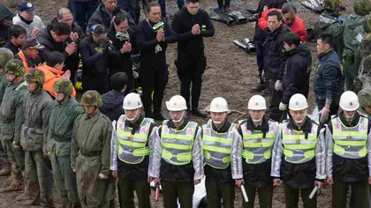 Familiile victimelor avionului prăbuşit în Taipei primesc despăgubiri de la compania aviatică