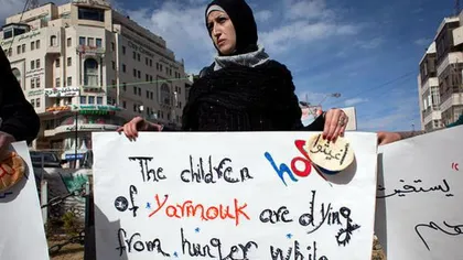 Iadul din Yarmouk: Cum se bat refugiaţii pe o bucată de pâine VIDEO