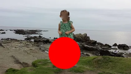 Şi-a fotografiat fetiţa la malul mării, însă atunci când a văzut imaginea, s-a îngrozit: Era o fantomă lângă