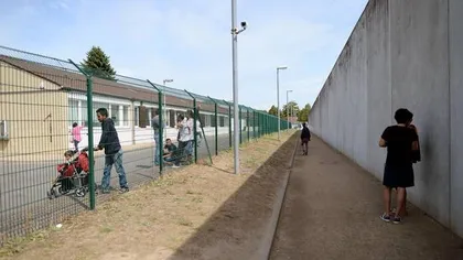 Furie în Germania: Un centru de refugiaţi a fost atacat cu sticle incendiare