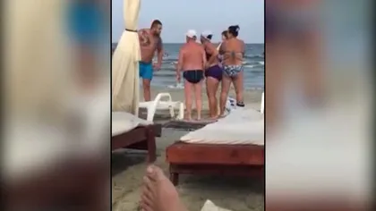 Scandal ca la uşa cortului, pe o plajă din Mamaia: O femeie a fost scuipată şi lovită VIDEO