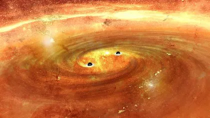 Coliziune între două găuri negre, observată în premieră de cercetători