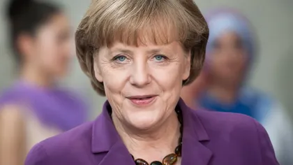 Băsescu: Generozitatea lui Merkel faţă de imigranţi, posibil stimulată de Premiul Nobel pentru Pace