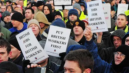 Criza euro şi salariile din România îi sperie pe britanici. Se tem că românii vor da năvală la muncă, în regat