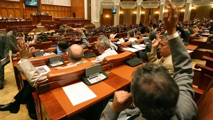Deputaţii au adoptat Legea dării în plată cu majoritatea voturilor
