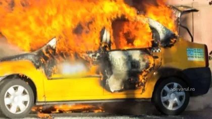 Un taxi a fost incendiat în Capitală, şoferul care i-a dat foc a fost reţinut VIDEO