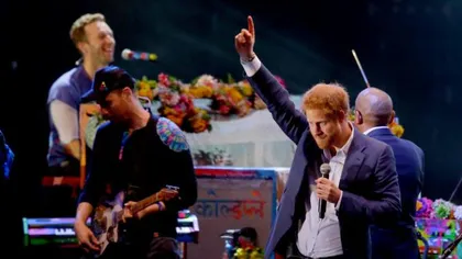 Prinţul Harry, pe scenă cu trupa Coldplay VIDEO