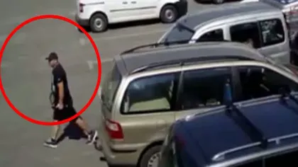 Tupeu fără margini! Furt din maşină în timp ce proprietarul autoturismului se afla lângă portbagaj VIDEO