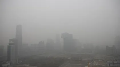 China se sufocă într-un nor de poluare