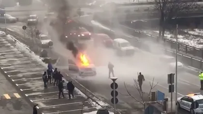 Momente de panică în parcarea unui mall, un bolid de lux a ars ca o torţă VIDEO