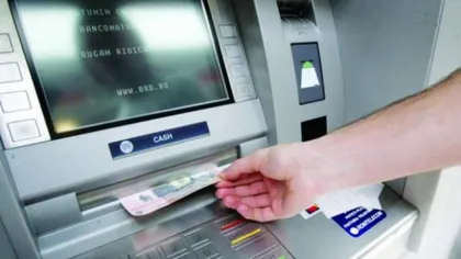 Băncile reduc numărul de bancomate
