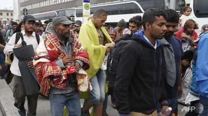 Austria vrea să se retragă din acordul UE privind relocarea de migranţi