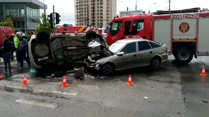 Accident grav în Capitală, maşină răsturnată