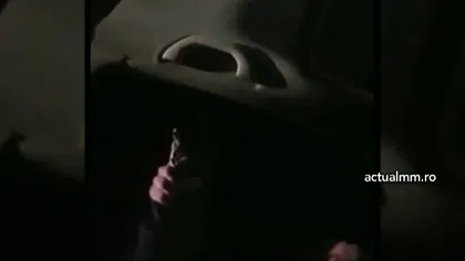 Imagini incredibile în Satu Mare. Şofer dat jos de un poliţist cu pistolul în mână VIDEO