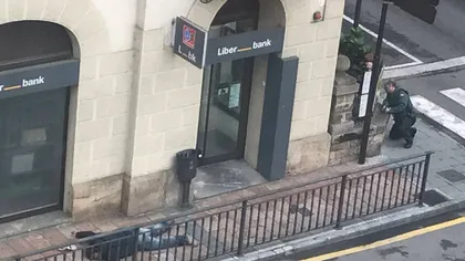 Jaf şi împuşcături la o bancă din provincia spaniolă Asturia. Directorul a fost luat ostatic, imagini de la asaltul poliţiei VIDEO