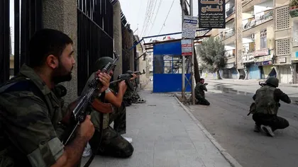 Lupte grele pentru eliberarea unei baze militare a regimului de la Damasc