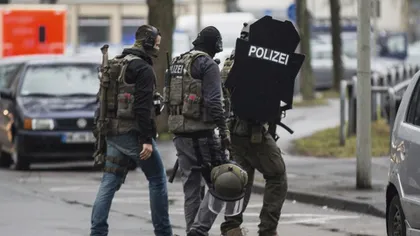 Român beat şi înarmat cu două arme, arestat în Germania