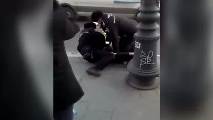 Scandal în centrul Capitalei. Un bărbat a fost pus la pământ şi încătuşat de poliţişti VIDEO