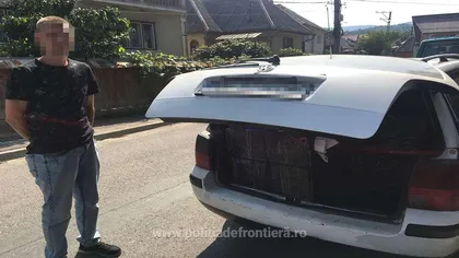 Bărbat din Maramureş, prins fără permis, la volanul unei maşini pline de ţigări de contrabadă