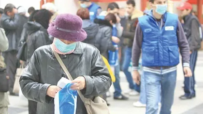 Epidemie de gripă în România. Ne apără măsca chirurgicală de gripă? Cât şi cum se poartă masca