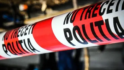 Un poliţist a fost găsit împuşcat în cap, lângă un cimitir, în Suceava