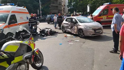 Accident cu patru răniţi în centrul capitalei. O şoferiţă nu i-a acordat prioritate unui motociclist
