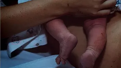 O femeie aflată în carantină a născut o fetiţă