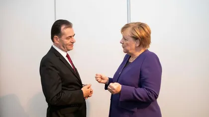 Ludovic Orban a discutat cu Angela Merkel la telefon, la iniţiativa ei. Românii plecaţi la cules de sparanghel, printre temele abordate