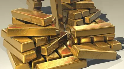 Preţul aurului a urcat la cel mai ridicat nivel din ultimii OPT ani