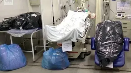 Corpuri ale victimelor noului coronavirus ţinute în saci lângă paturile pacienţilor din Brazilia