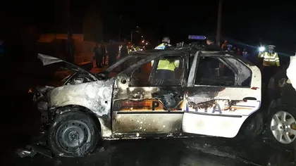 Accident grav în Argeş. O maşină de poliţie a luat foc