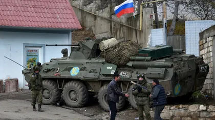 Rusia recunoaşte că ar putea interveni în conflictul din Ucraina: 