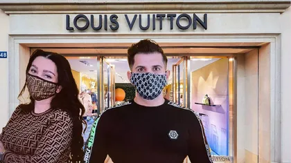 Casa de modă Louis Vuitton cere despăgubiri de la soţii Pastramă în scandalul măştilor contrafăcute