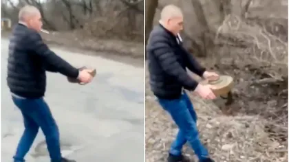 Momentul incredibil în care un ucrainean scapă pe jos o mină antitanc în încercarea de a o muta dintr-o zonă cu case într-una cu copaci. VIDEO