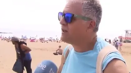 Un hoţ a furat o geantă de pe plaja din Barcelona chiar la câţiva metri de un interviu în direct. Poliţiei i-a fost uşor să-l identifice VIDEO