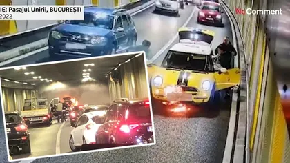 Momentul în care mașina unde se aflau doi adulți și un copil a luat foc, în Pasajul Unirii - VIDEO