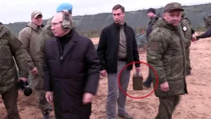 VIDEO Vladimir Putin, filmat când trage cu arma, ca un lunetist. Apariţie controversată a preşedintelui, şi-a luat cu el la antrenament 